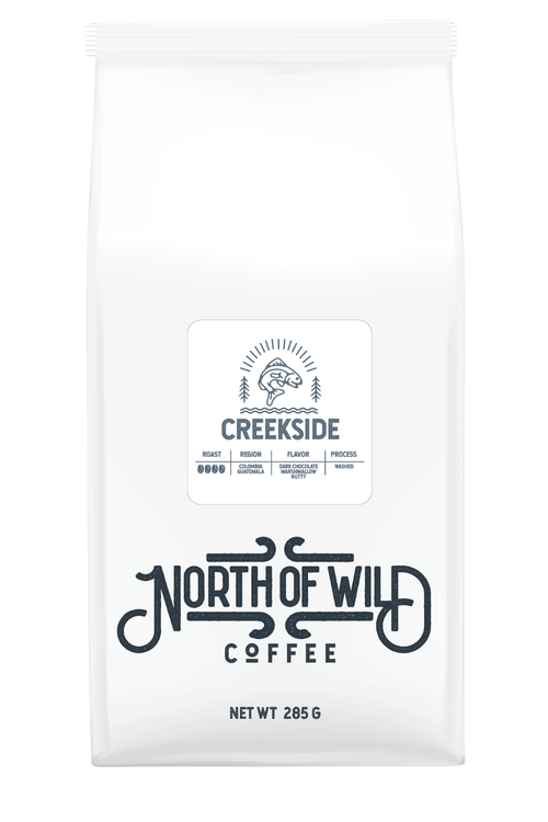 "Creekside dark roast coffee bag — Colombia & Guatemala blend with dark chocolate and marshmallow notes"