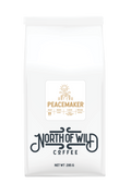 "Peacemaker light-medium roast decaf coffee bag — single origin Mexico with apple and hot chocolate notes"
