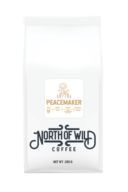 "Peacemaker light-medium roast decaf coffee bag — single origin Mexico with apple and hot chocolate notes"
